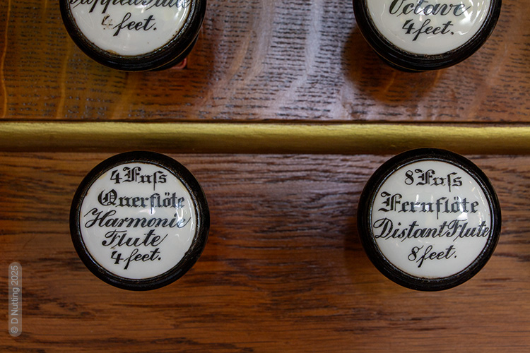 Photo &copy; D Nutting: church organ, stop knobs