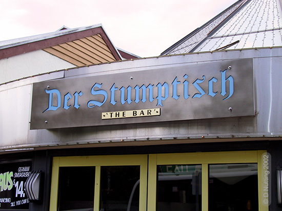 (Photo &copy; D. Nutting) sign on building