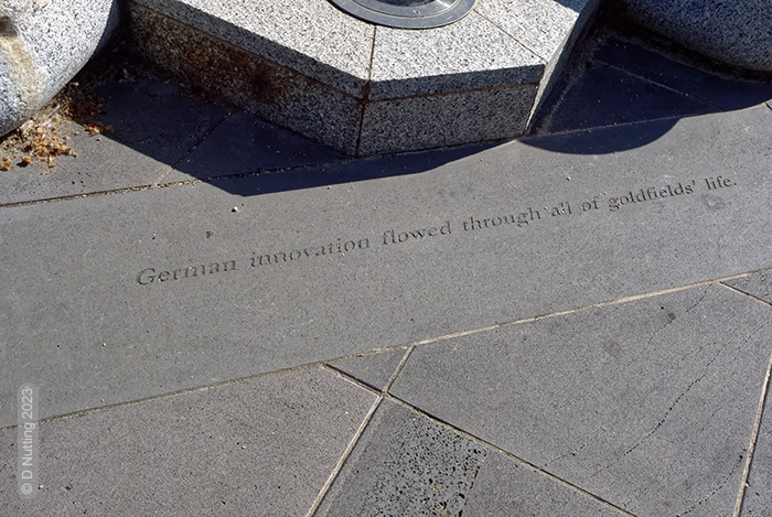Photo © D Nutting: inscription on a fountain